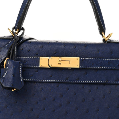 Kelly 25 Bleu Iris Sellier Ostrich Gold Hardware