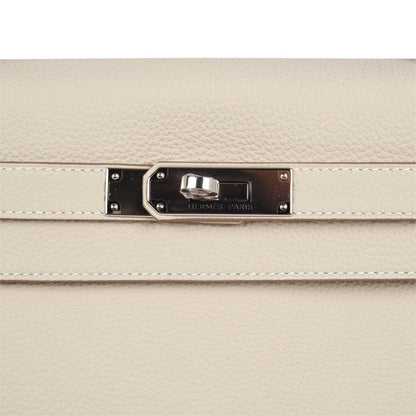 Limited Edition Kelly 32 Retourne Bag Au Galop Craie Togo Leather with Palladium Hardware